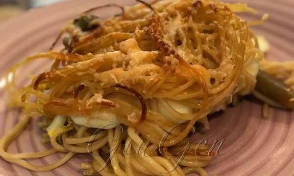 Spaghetti e carciofi al forno
